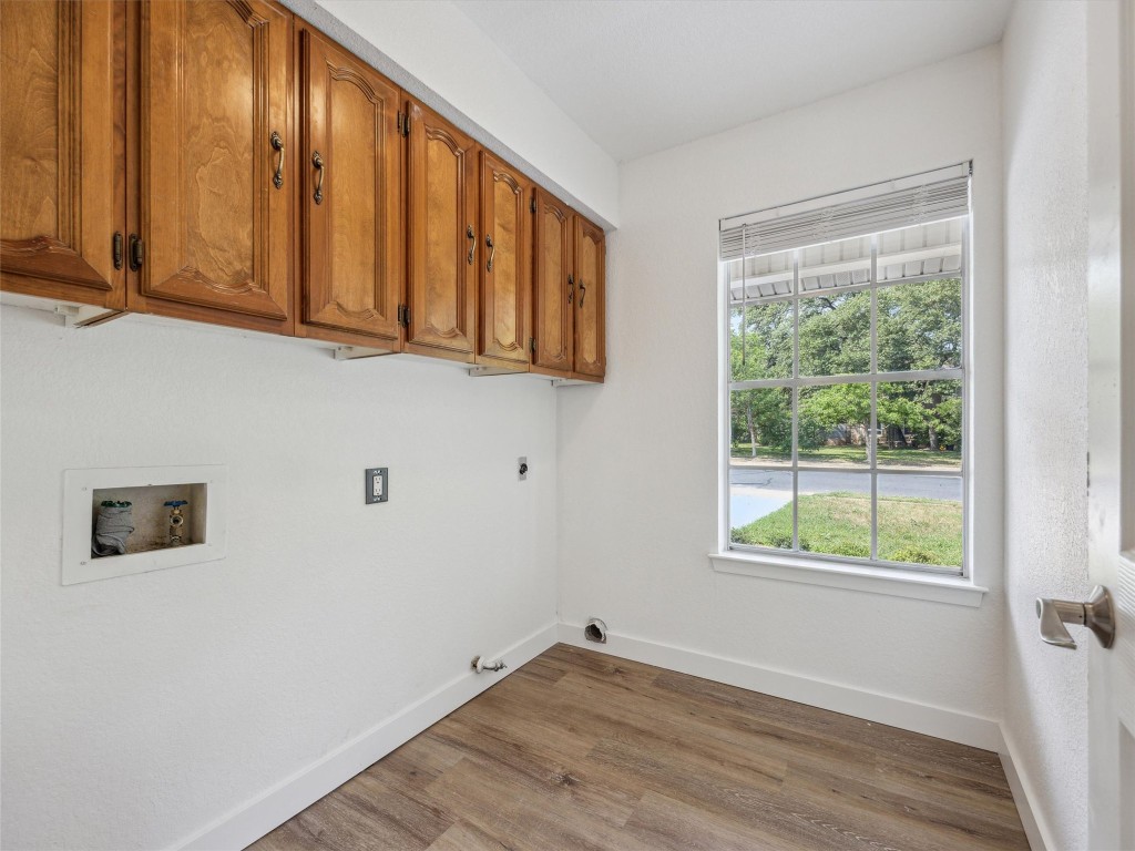 4525 Langtry Lane Austin, TX 78749 - Photo 25 of 31 a view of a room with wooden floor and fan