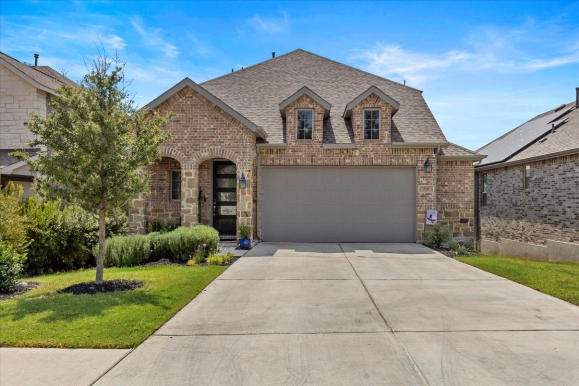 220 Arrowhead Mound Road Georgetown, TX 78628 - Photo 1 of 1 a front view of a house with a yard