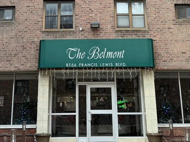 a front view of a building with glass windows