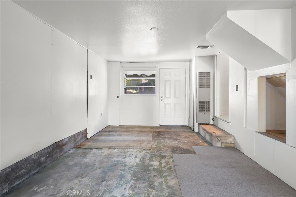 1617 Arcadian Avenue Chico, CA 95926 - Photo 12 of 34 an empty room with windows and refrigerator