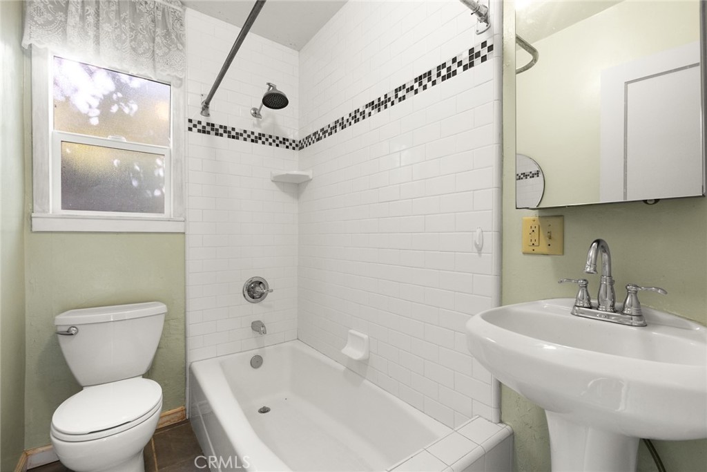 1617 Arcadian Avenue Chico, CA 95926 - Photo 14 of 34 a bathroom with a sink a toilet and shower