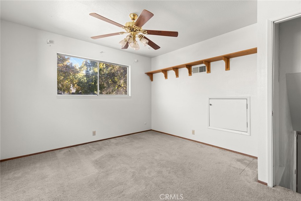 1617 Arcadian Avenue Chico, CA 95926 - Photo 16 of 34 an empty room with windows and fan