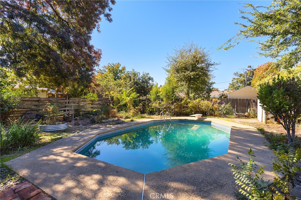 1617 Arcadian Avenue Chico, CA 95926 - Photo 29 of 34 a view of a swimming pool with a yard in the back