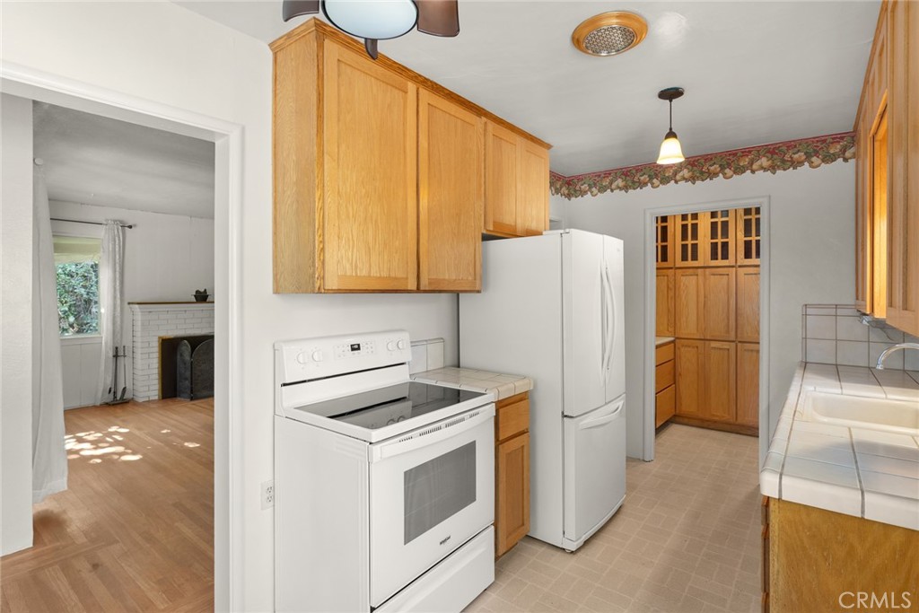 1617 Arcadian Avenue Chico, CA 95926 - Photo 8 of 34 a kitchen with a refrigerator sink and stove