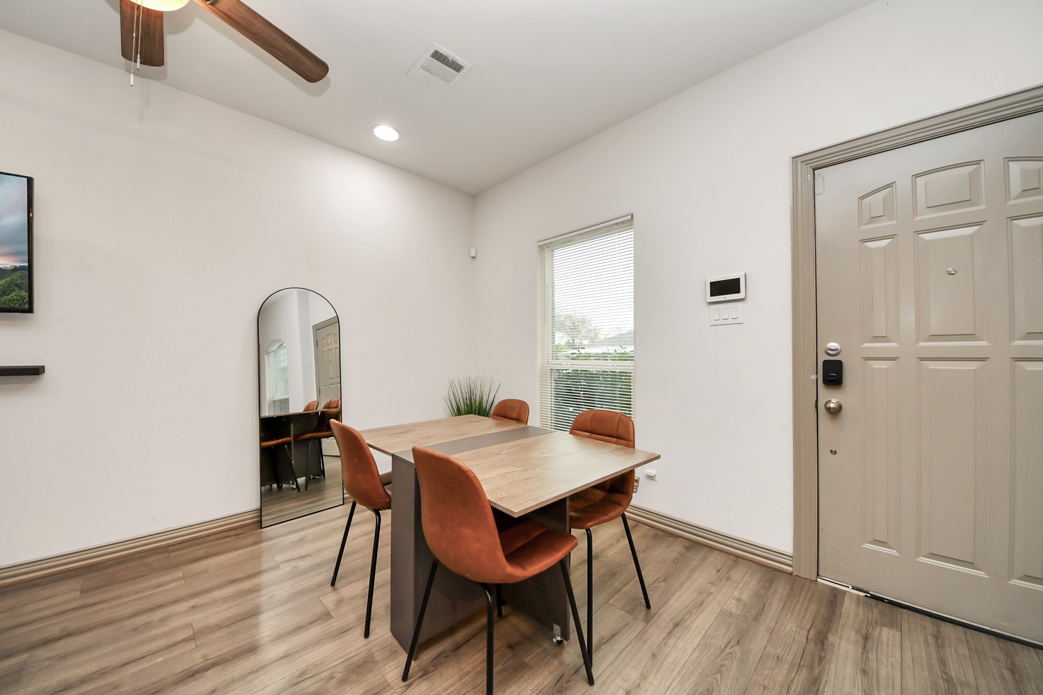 5334 Pershing Street Houston, TX 77033 - Photo 38 of 43 a view of a dining room with furniture and wooden floor