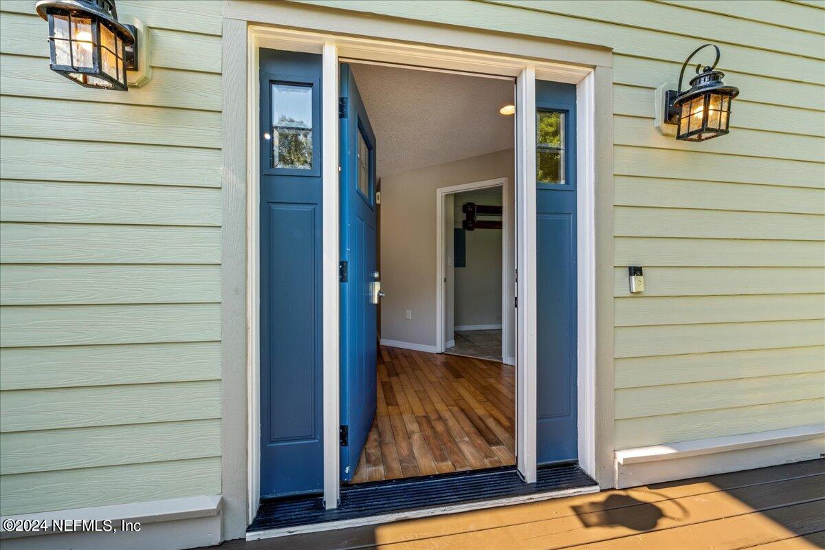 260 Brickyard Road Middleburg, FL 32068 - Photo 12 of 52 a view of front door and bedroom