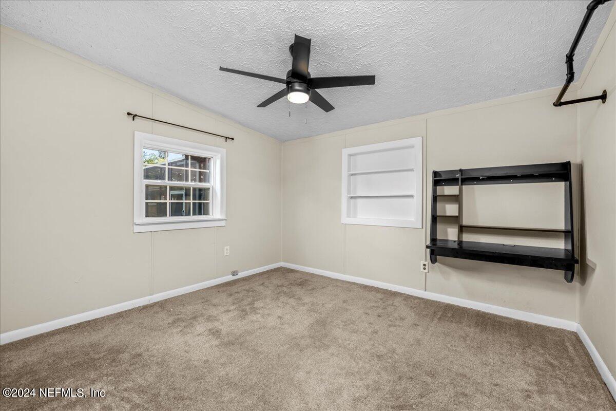 260 Brickyard Road Middleburg, FL 32068 - Photo 28 of 52 a view of room with ceiling fan