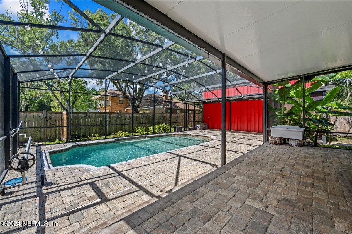 260 Brickyard Road Middleburg, FL 32068 - Photo 36 of 52 a view of a backyard with plants and a patio