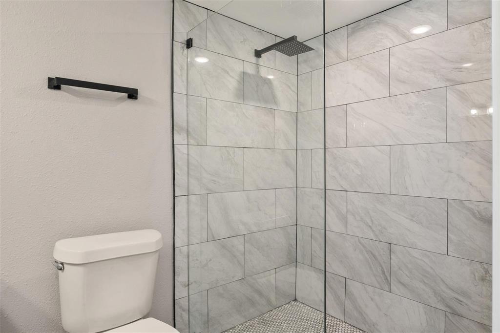 19930 Leisure Land Road Payne Springs, TX 75156 - Photo 15 of 21 a bathroom with a toilet and a shower