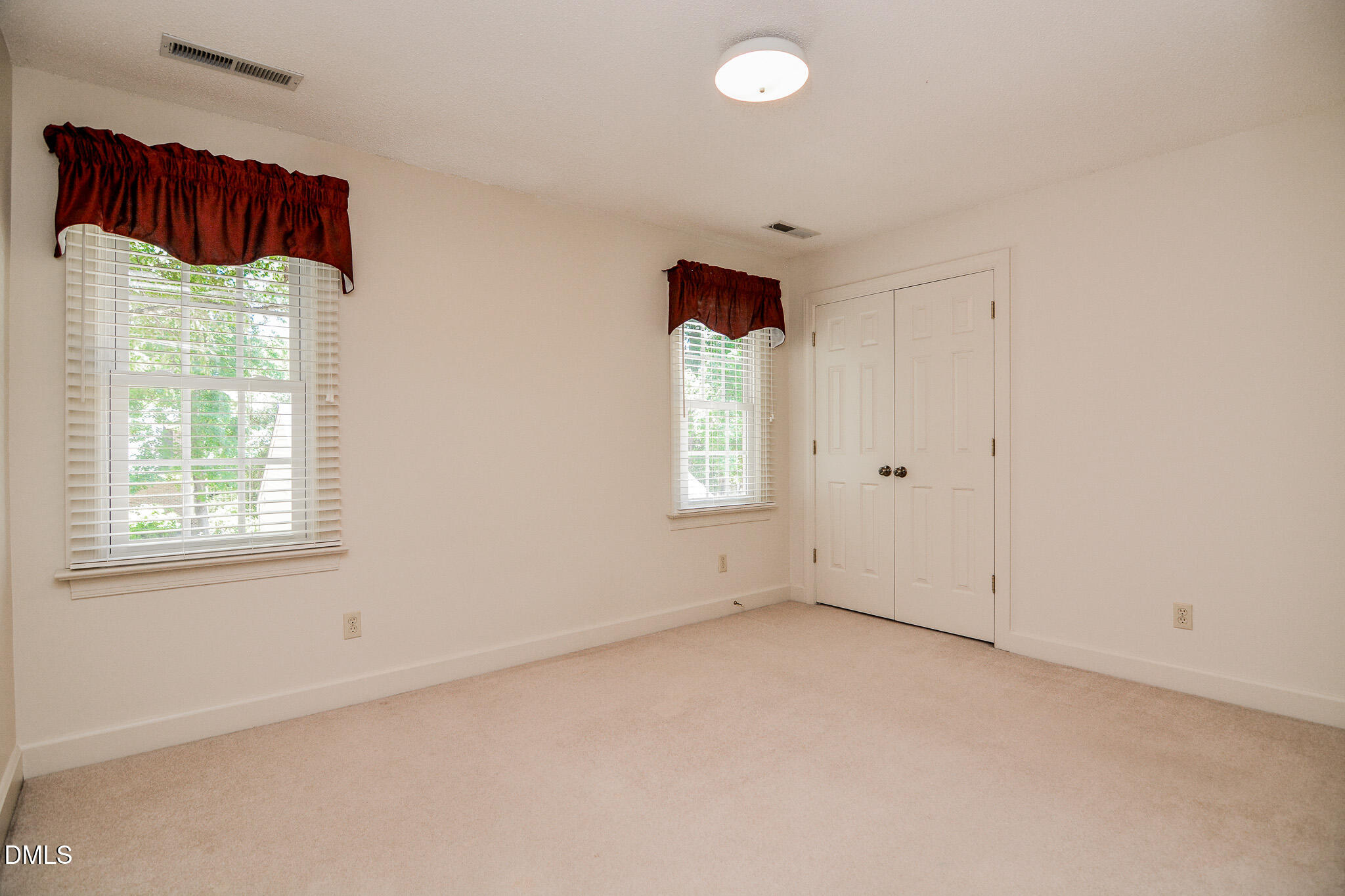 1215 Cambridge Road Northwest Wilson, NC 27896 - Photo 44 of 54 an empty room with windows