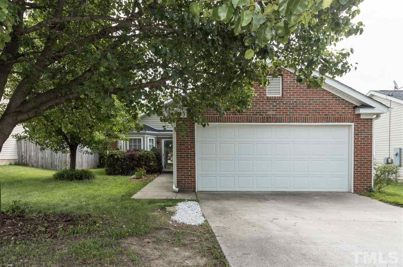 5008 Silverdene Street Raleigh, NC 27616 - Photo 1 of 23 a front view of house with yard and green space