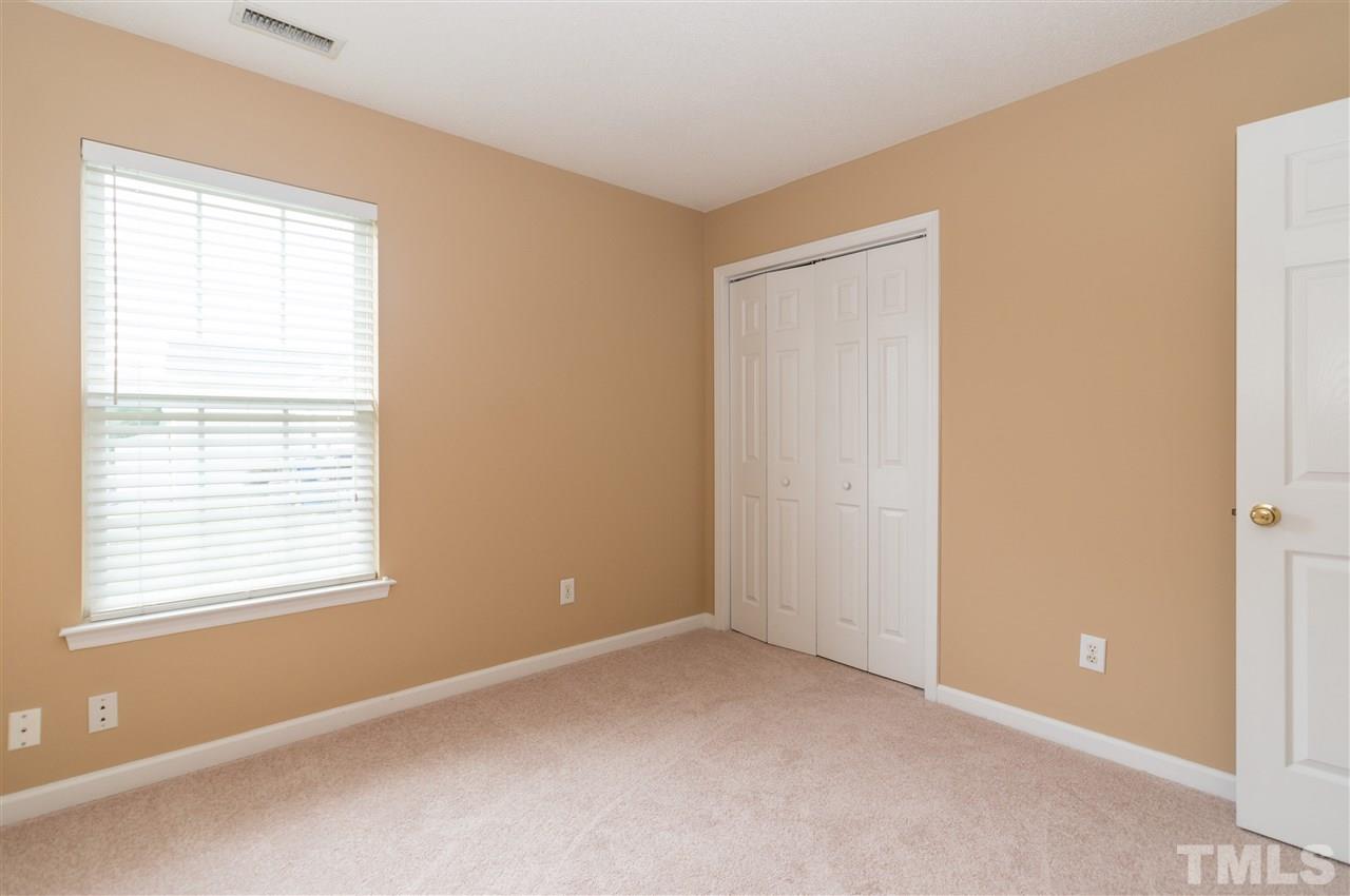 5008 Silverdene Street Raleigh, NC 27616 - Photo 14 of 23 a view of an empty room with a window