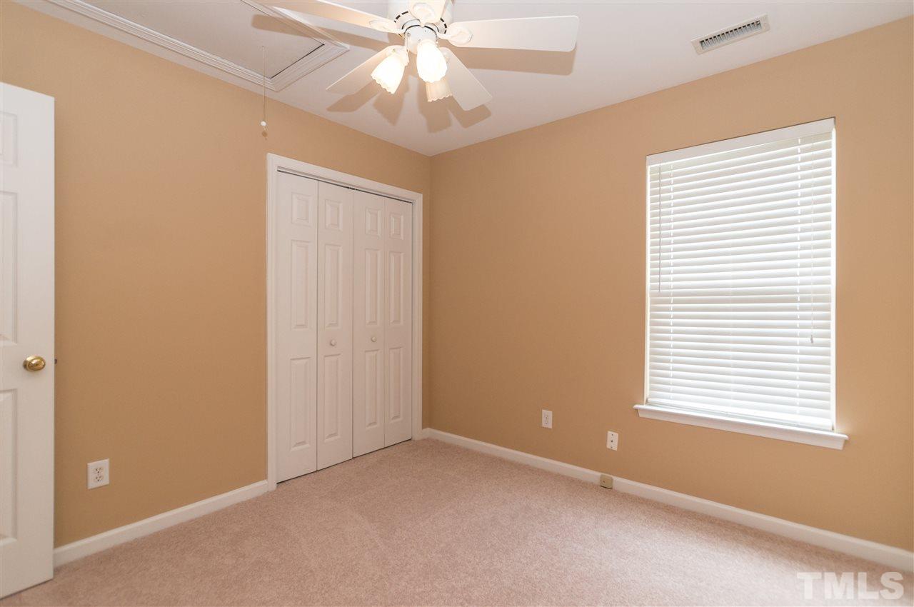 5008 Silverdene Street Raleigh, NC 27616 - Photo 17 of 23 a view of an empty room with a window