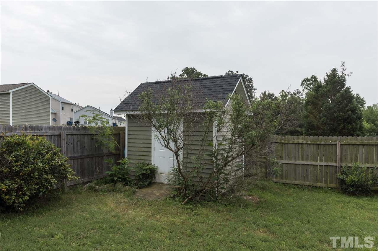 5008 Silverdene Street Raleigh, NC 27616 - Photo 21 of 23 a backyard of a house with lots of green space