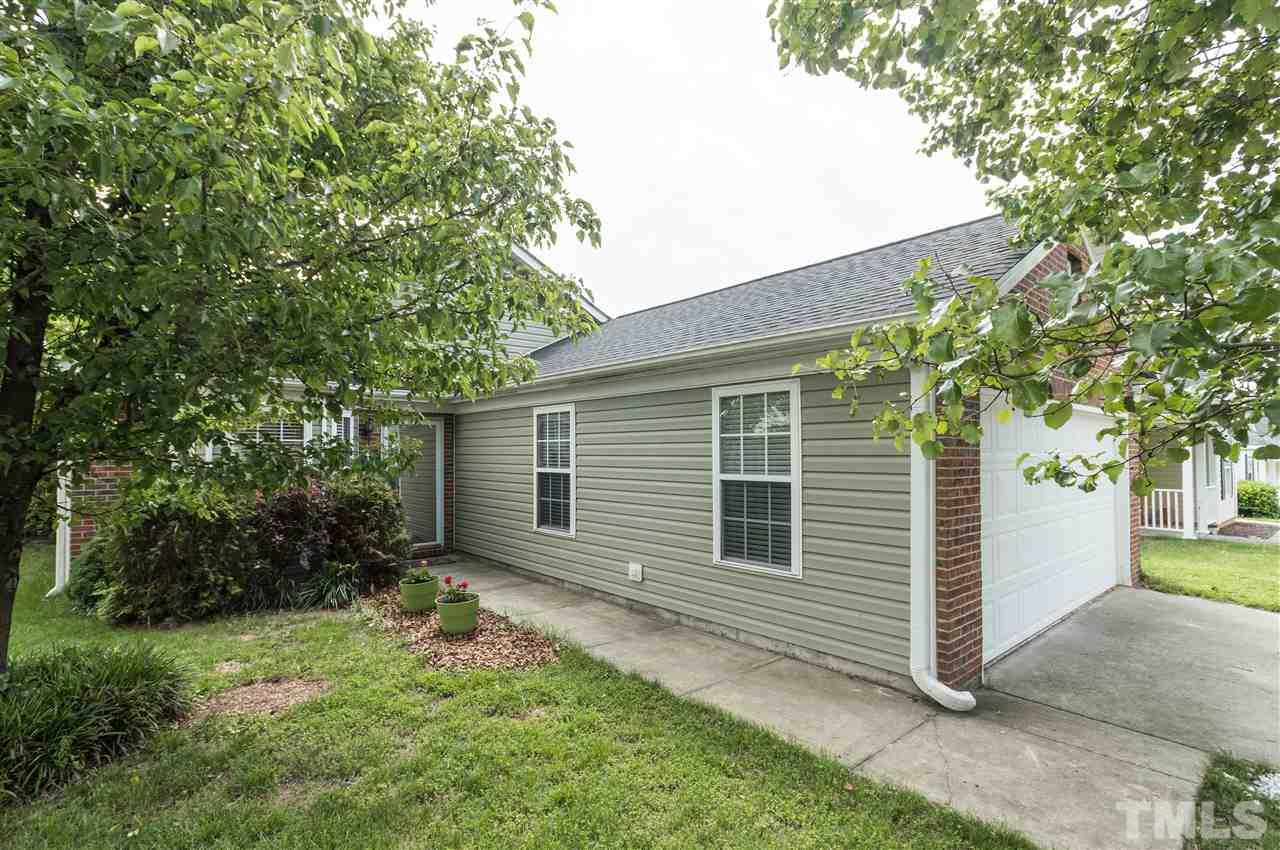 5008 Silverdene Street Raleigh, NC 27616 - Photo 23 of 23 a house with a tree in the yard
