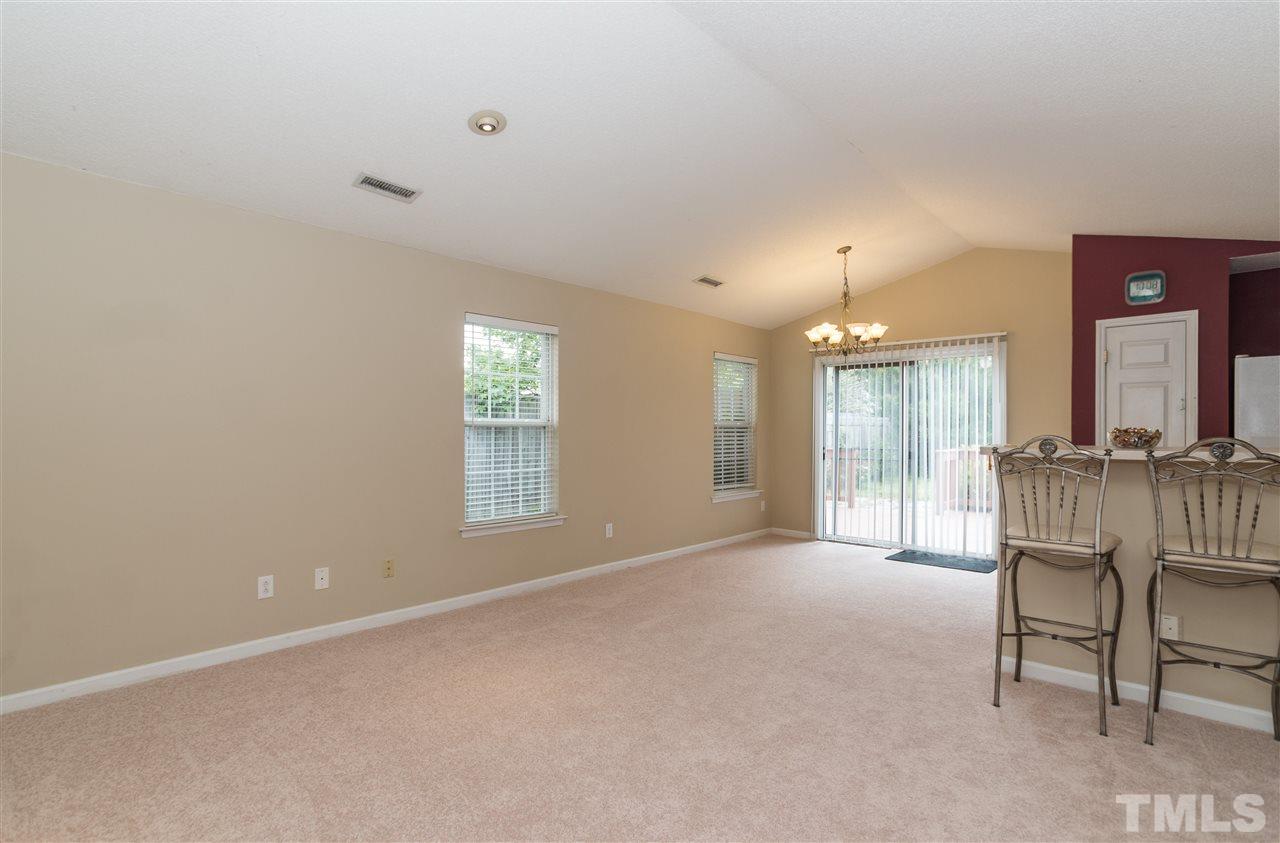 5008 Silverdene Street Raleigh, NC 27616 - Photo 4 of 23 a view of an empty room with a window