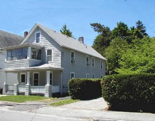 27 Holbrook Street Ansonia, CT 06401 - Photo 1 of 1 a front view of a house with garden