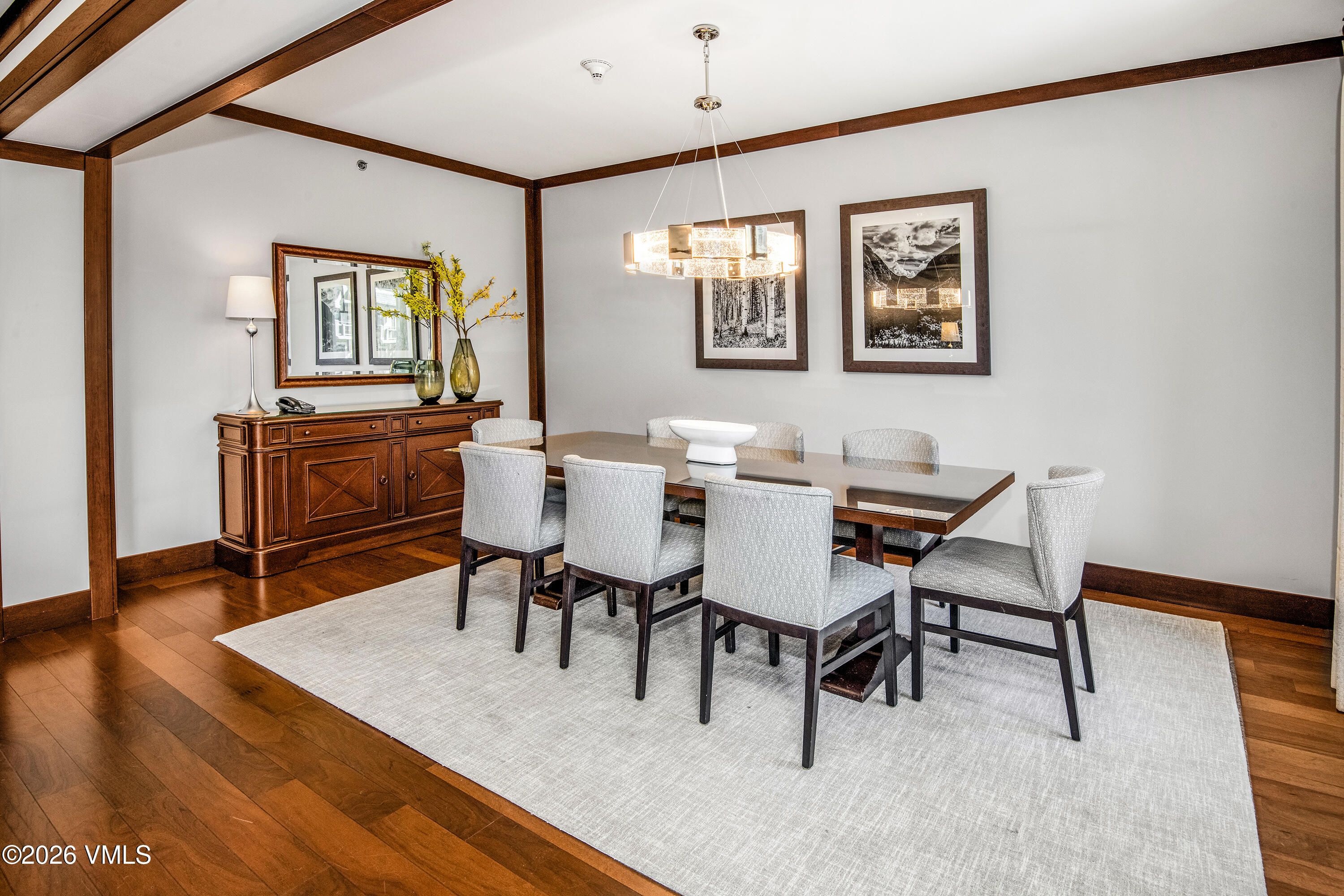 1 Vail Road, Unit 5102C Vail, CO 81657 - Photo 4 of 13 a view of a dining room with furniture and wooden floor