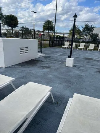 a view of outdoor space with seating area