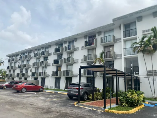 a front view of a building with street view