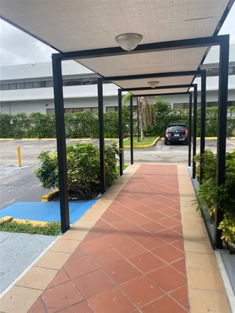 a view of swimming pool with a patio