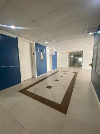 a view of a hallway with a workspace