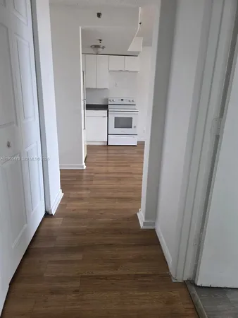 a view of storage and utility room in wooden floor