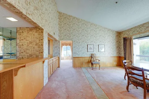 a living room with furniture and a couch