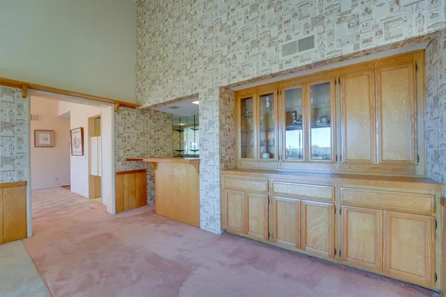 view of hall with wooden floor
