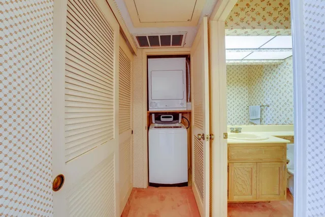 a view of bathroom with a tub shower and mirror