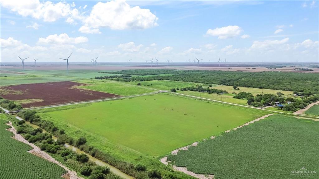 0 Fm 506 Highway Santa Rosa, TX 78593 - Photo 6 of 7 Expansive agricultural landscape featuring multiple cultivated fields and natural waterways