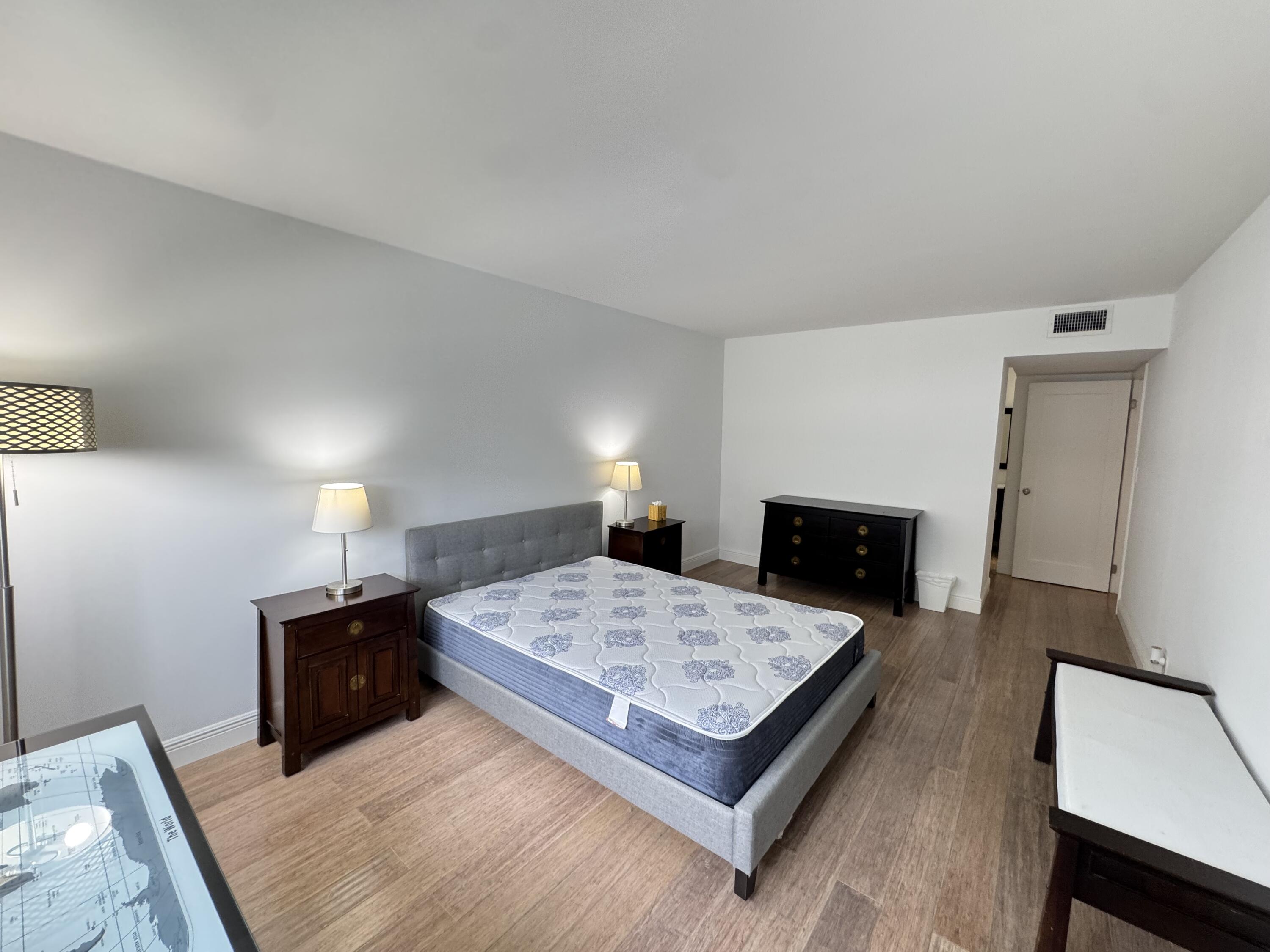 3540 South Ocean Boulevard, Unit 608 South Palm Beach, FL 33480 - Photo 9 of 35 a living room with furniture and a fireplace