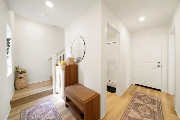 a bed room with a bed and a television