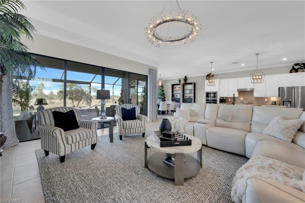 17852 Rosehill Court Estero, FL 33928 - Photo 1 of 50 A seamless indoor/outdoor feel