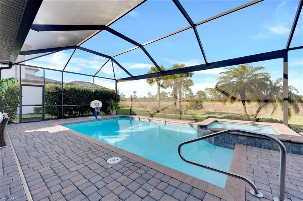 17852 Rosehill Court Estero, FL 33928 - Photo 3 of 50 Expanded Lanai with Pool and Spa