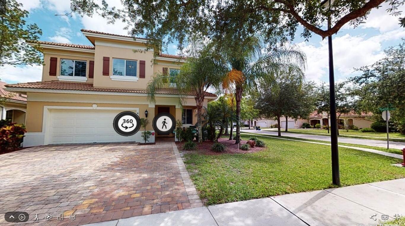 6726 Bulrush Court Greenacres, FL 33413 - Photo 48 of 54 Front Elevation