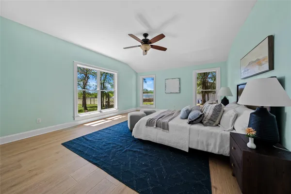 a bed room with bed and a window