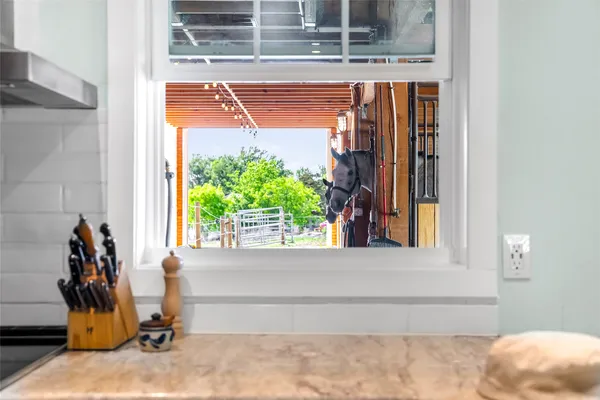 a bedroom with a bed and a table in it