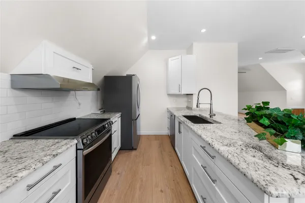 a bedroom with a workspace