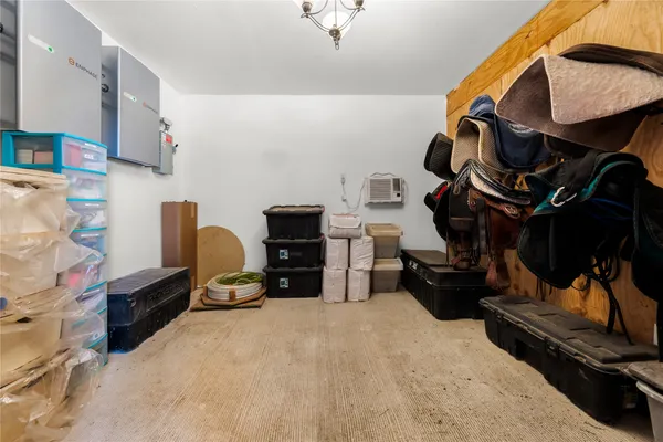 a view of a house with backyard and trees