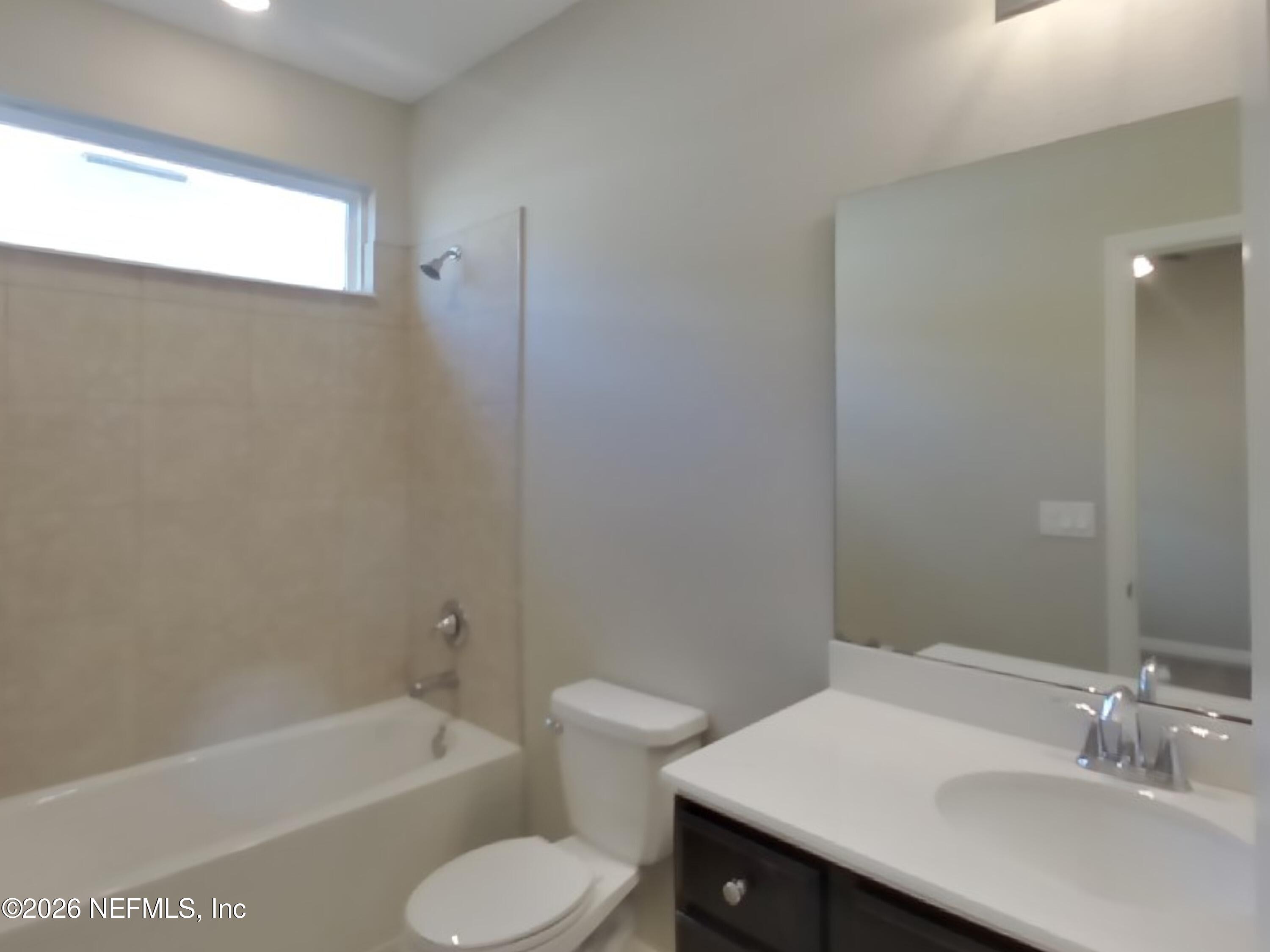 155 Bloomfield Way St. Augustine, FL 32092 - Photo 12 of 15 a bathroom with a sink toilet and bathtub