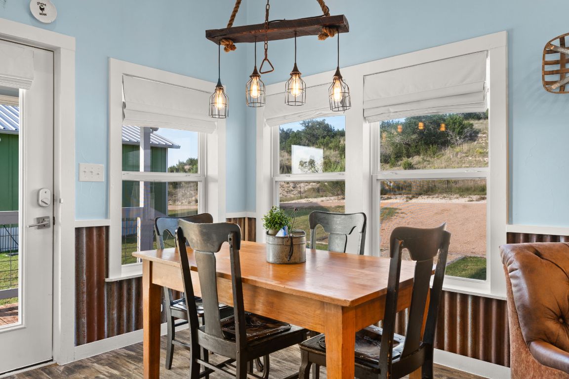 365 Billy Sisson Road Johnson City, TX 78636 - Photo 12 of 40 a view of a dining room with furniture window and outside view