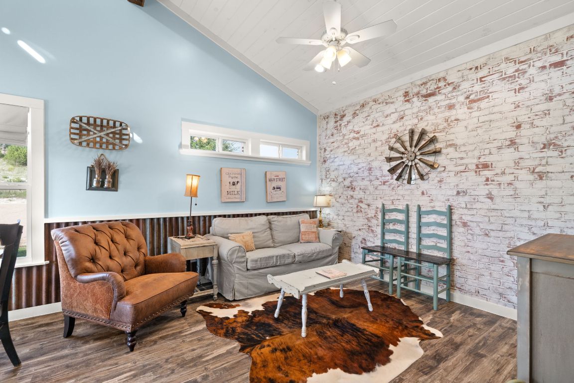 365 Billy Sisson Road Johnson City, TX 78636 - Photo 16 of 40 a living room with furniture and wooden floor