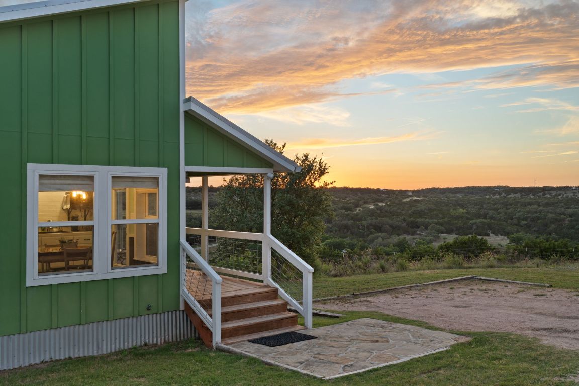 365 Billy Sisson Road Johnson City, TX 78636 - Photo 23 of 40 a view of a house with a backyard