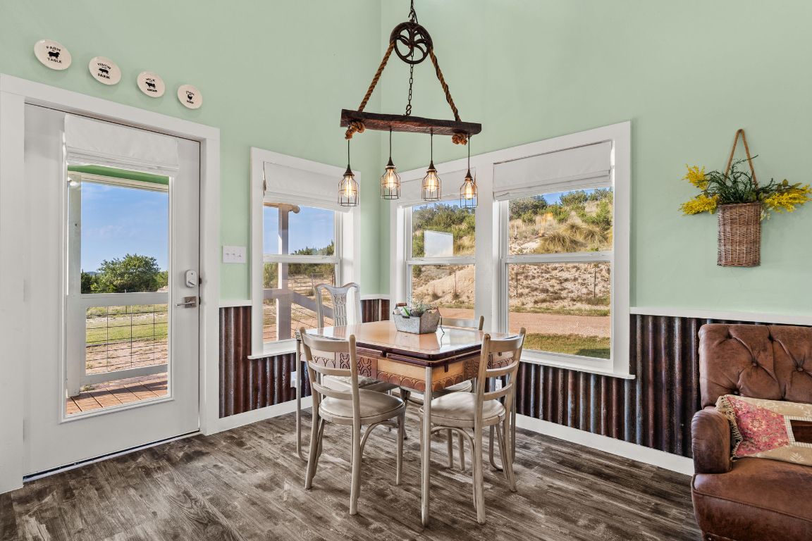 365 Billy Sisson Road Johnson City, TX 78636 - Photo 25 of 40 a view of a dining room with furniture window and outside view