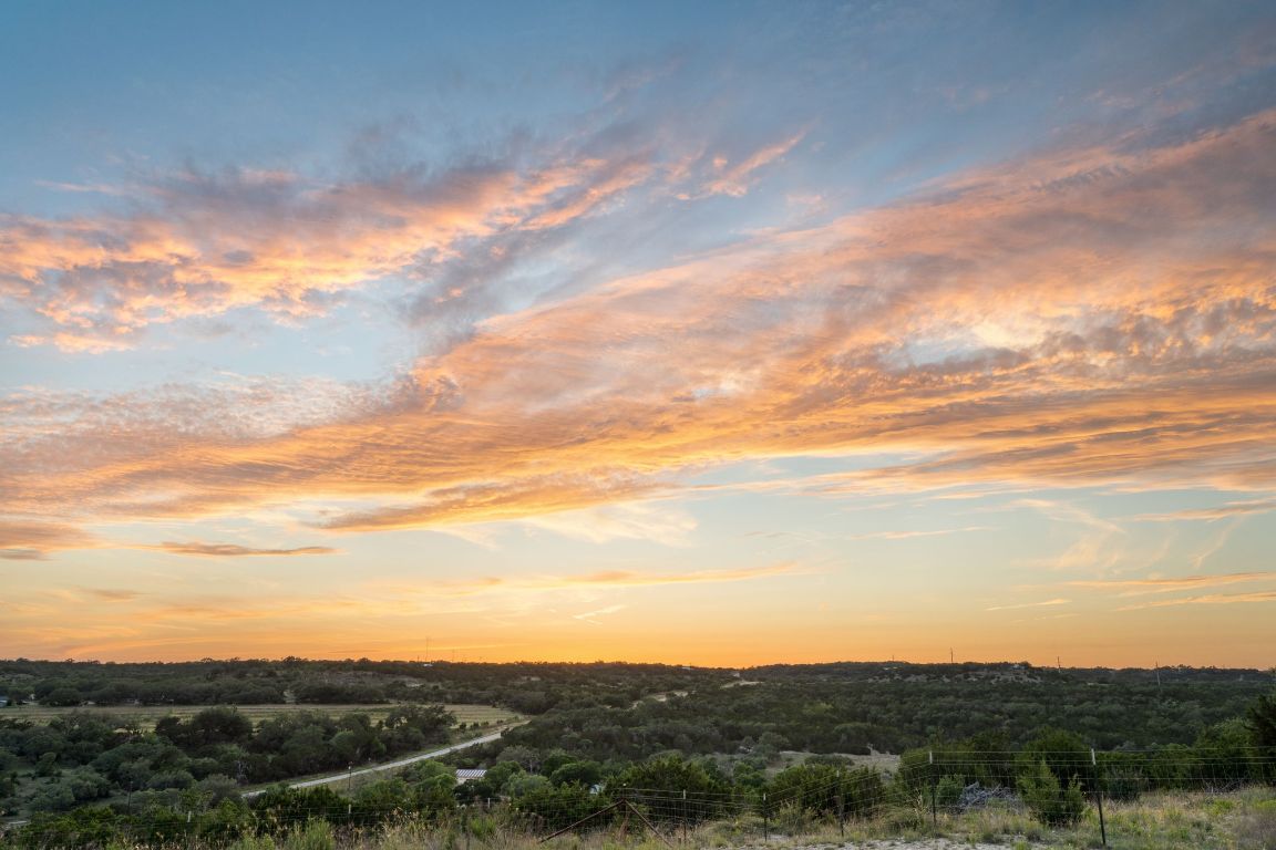 365 Billy Sisson Road Johnson City, TX 78636 - Photo 3 of 40 a view of a mountain in the mountains
