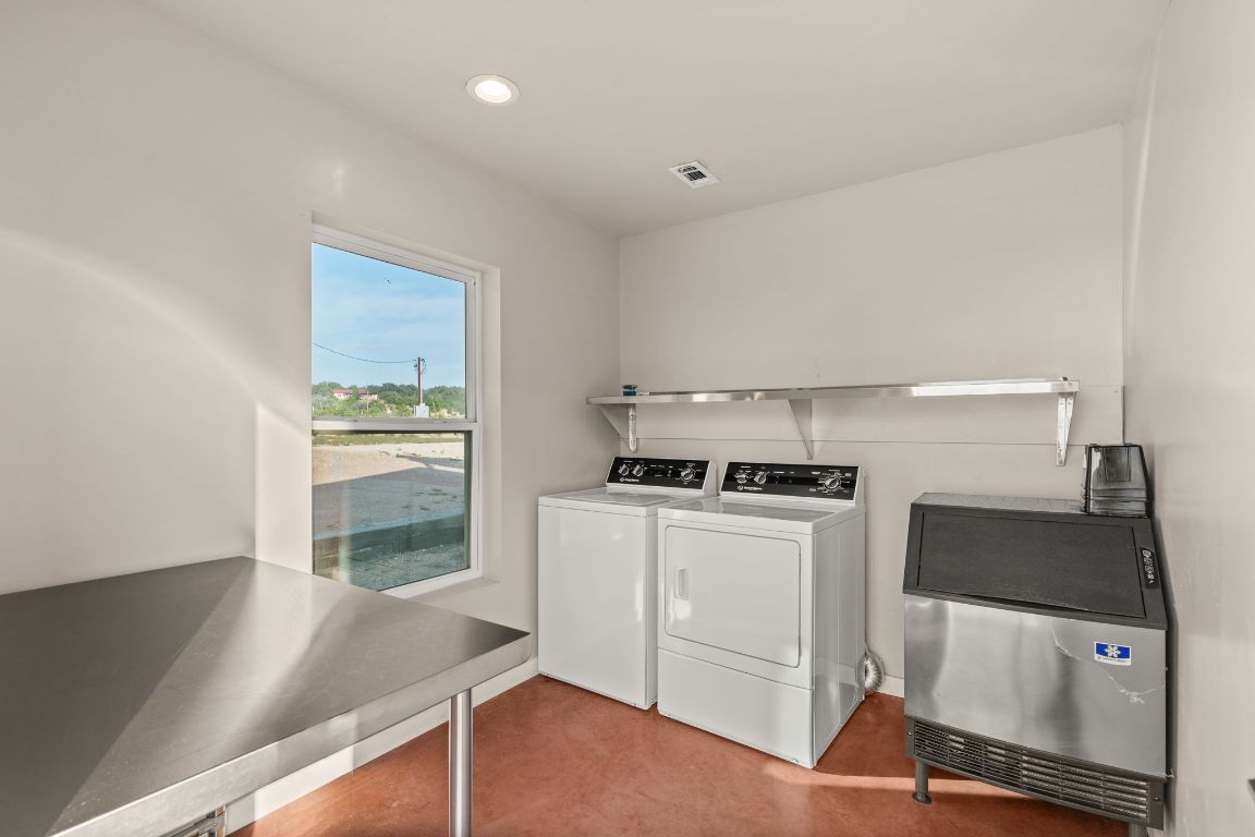 365 Billy Sisson Road Johnson City, TX 78636 - Photo 32 of 40 a kitchen with a stove and a refrigerator