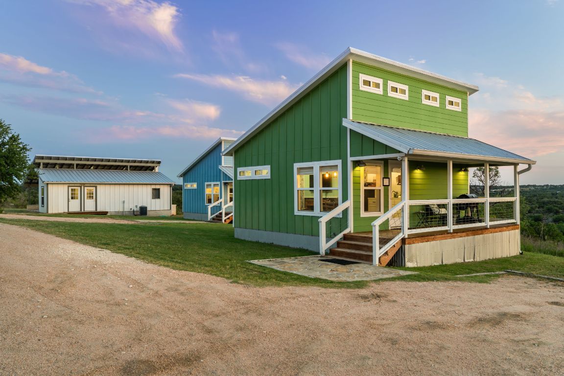 365 Billy Sisson Road Johnson City, TX 78636 - Photo 34 of 40 a view of a house with a yard and sitting area