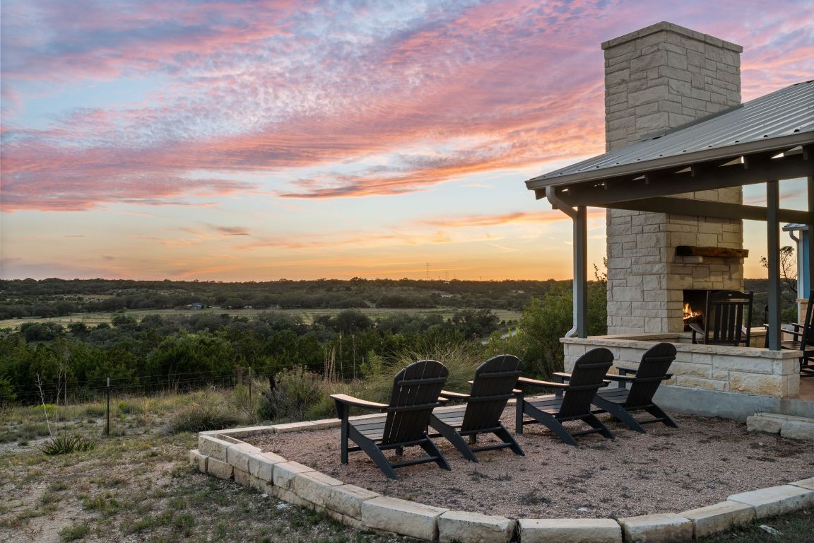 365 Billy Sisson Road Johnson City, TX 78636 - Photo 5 of 40 a view of a lake with a table and chairs