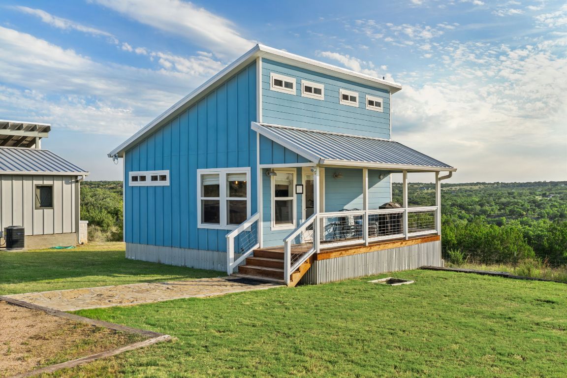 365 Billy Sisson Road Johnson City, TX 78636 - Photo 8 of 40 front view of a house with a yard